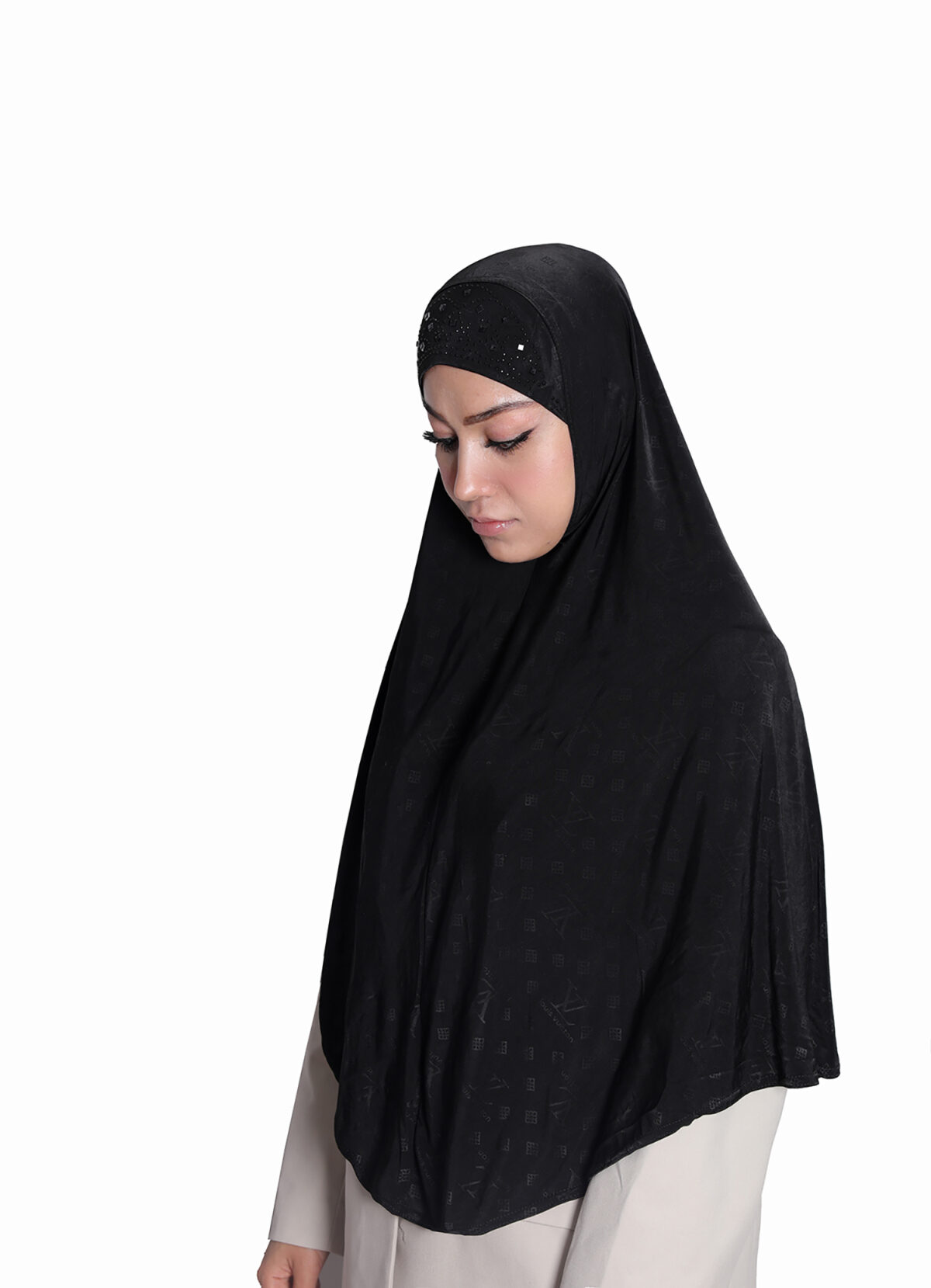 The back view of a Black Patterned Embellished Hijab showcasing a central rhinestone sunburst design and subtle all-over geometric pattern on the flowing fabric.