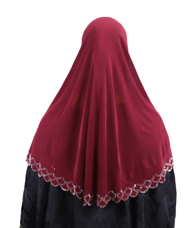 A close-up view of the Maroon Embroidered Hijab with Beadwork, focusing on the elaborate rhinestone cap pattern and the scalloped trim near the collarbone.