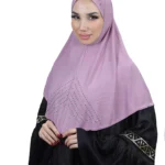 A woman models a Light Purple Rhinestone Hijab, facing forward and showcasing the full front panel with the prominent sunburst rhinestone design.