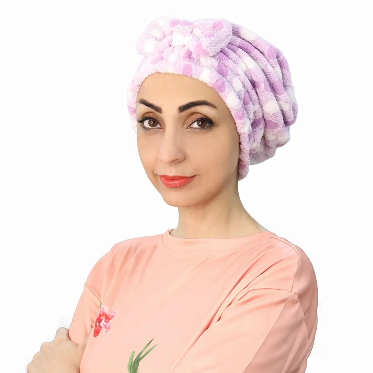 A woman models a Plush Comfort Fashion Turban in a deep color, showing the stylish criss-cross pleating detail at the front.