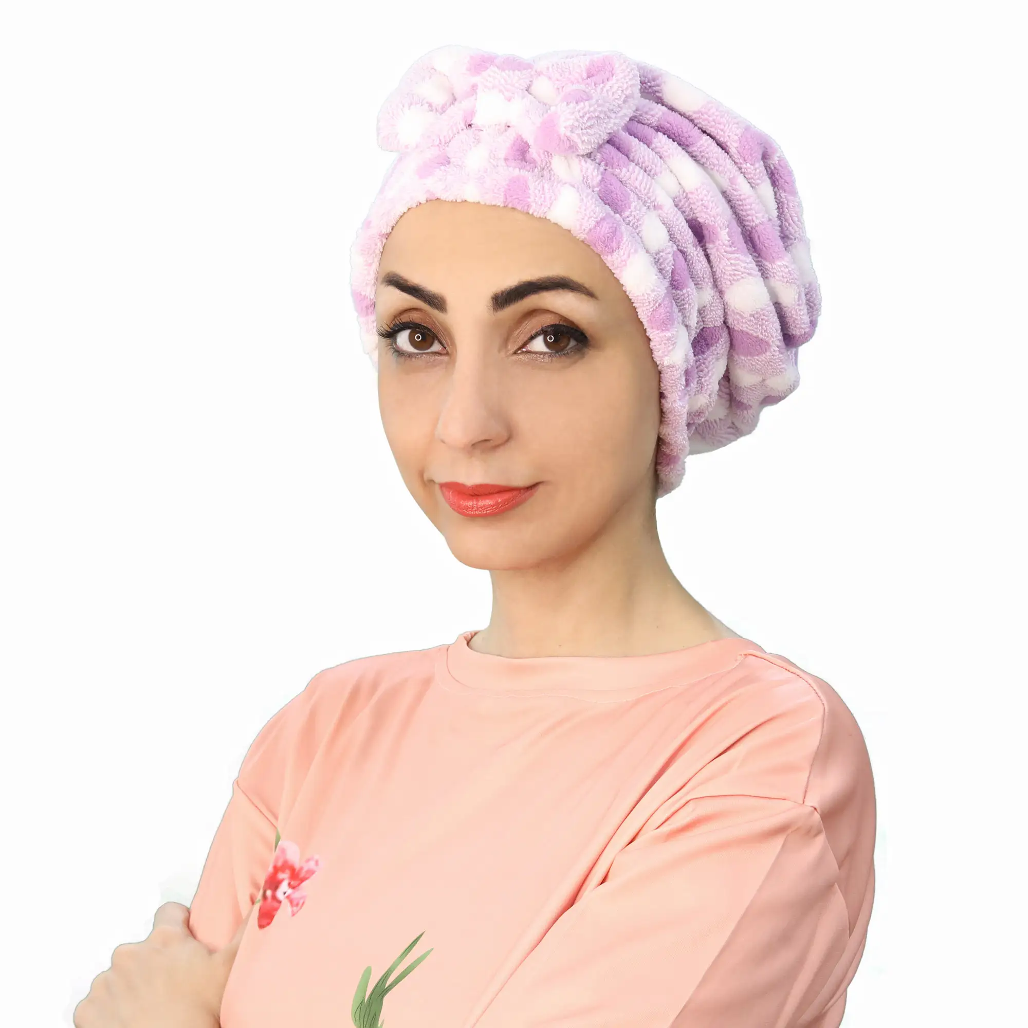 A woman models a Plush Comfort Fashion Turban in a deep color, showing the stylish criss-cross pleating detail at the front.