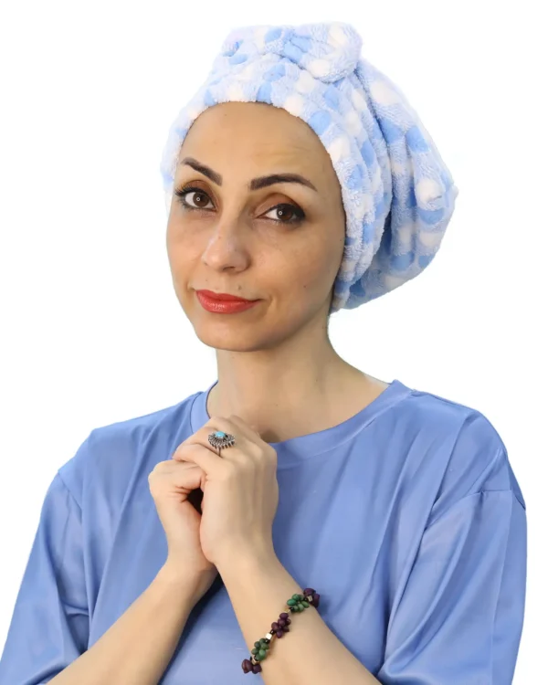 A side view of a woman modeling the Plush Comfort Fashion Turban, highlighting the full head coverage and the soft, velvet-like texture of the fabric.
