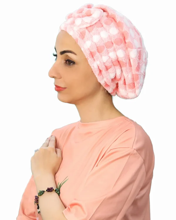 A woman models a Plush Comfort Fashion Turban, viewed from the front, showcasing the elegant pleated design and comfortable, ready-to-wear fit.