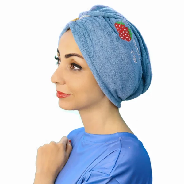 A woman models a Comfortable Embroidered Fashion Turban, viewed from the front, highlighting the soft fabric, full coverage, and the detailed, patterned embroidery centered above the forehead.