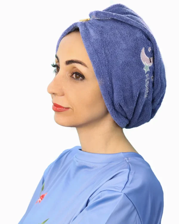 A woman models a Comfortable Embroidered Fashion Turban, viewed at an angle, highlighting the soft, gathered material and the ease of the slip-on style.