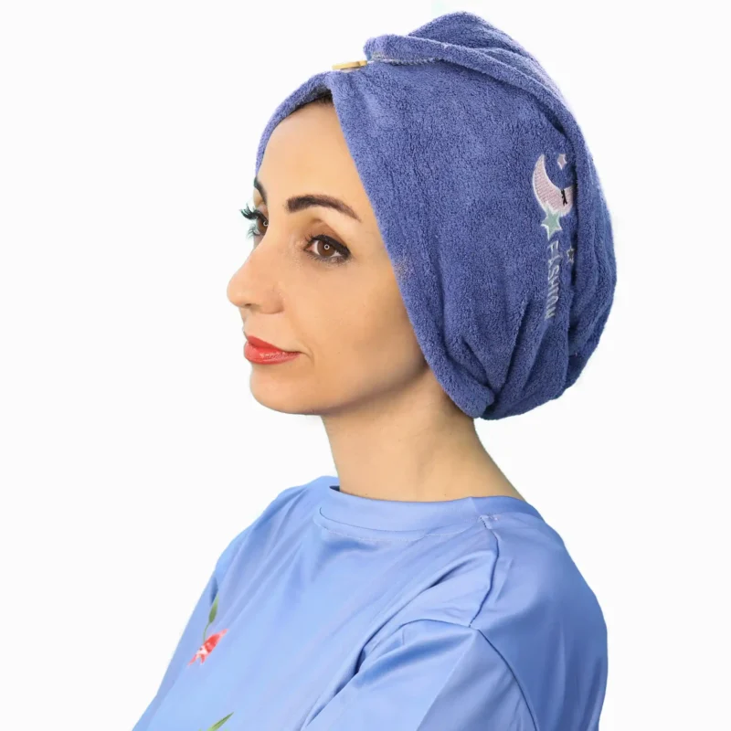 A woman models a Comfortable Embroidered Fashion Turban, viewed at an angle, highlighting the soft, gathered material and the ease of the slip-on style.