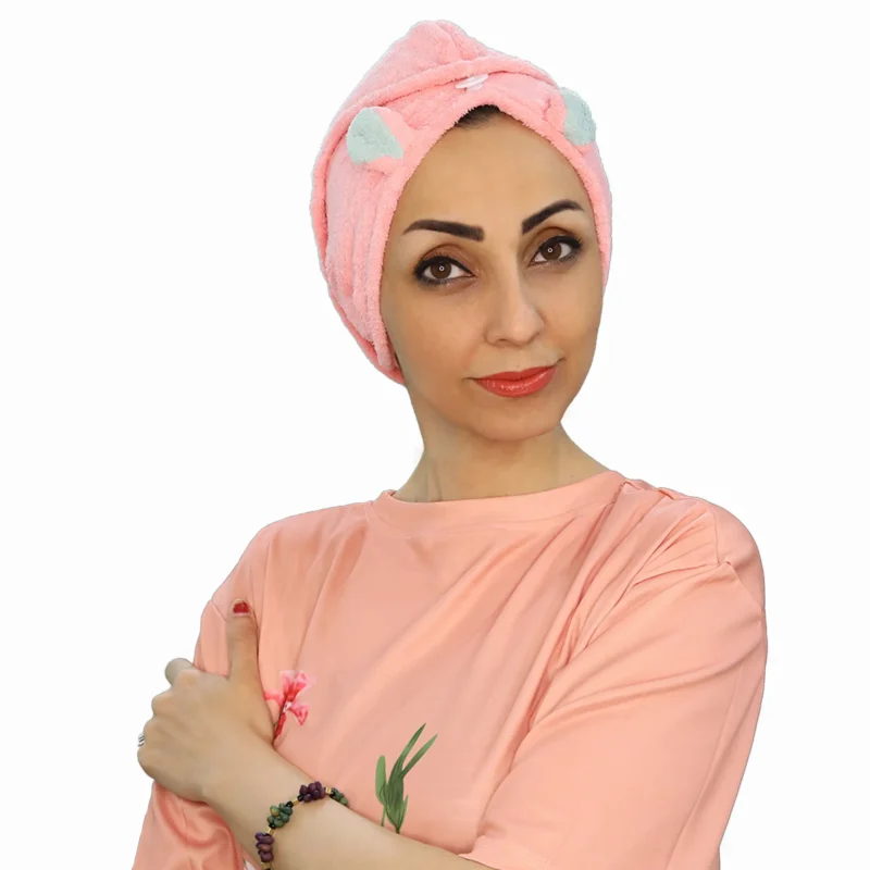 A woman models a Plush Cute Ear Turban Wrap, viewed from the side, emphasizing the soft, comfortable material and the placement of the decorative ears.