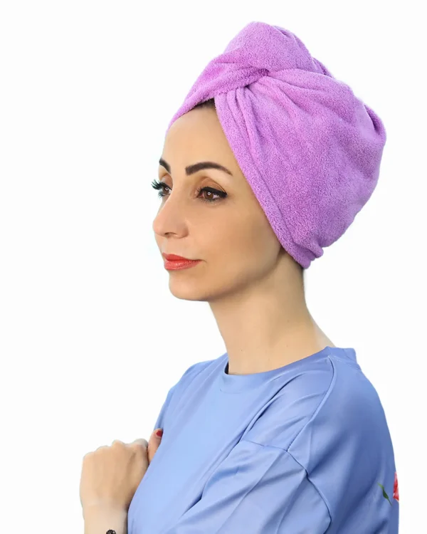A woman modeling the Soft Microfiber Hair Drying Turban, viewed from the side, emphasizing the plush texture and the full coverage around the hair.