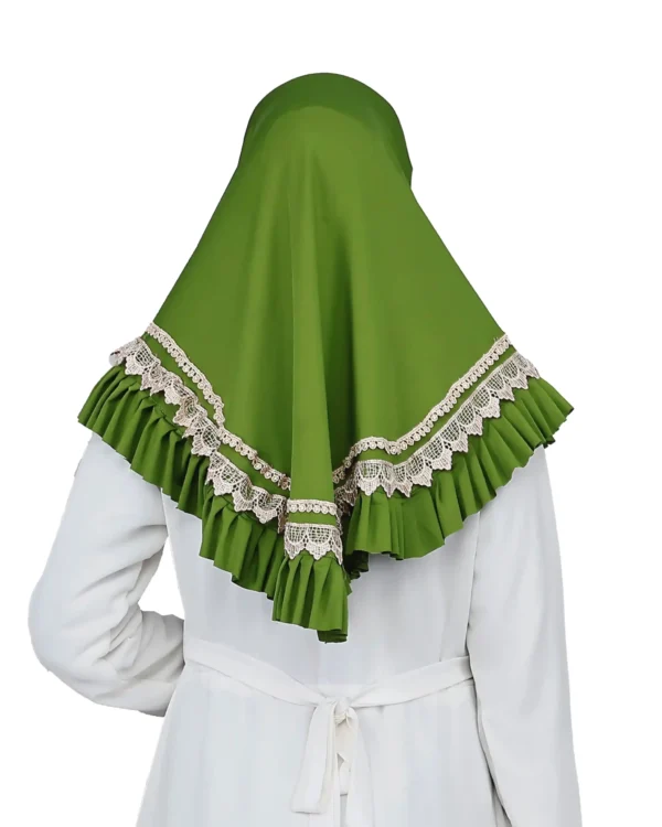 A woman models a Vibrant Green Ruffled and Lace Hijab, viewed from the side, emphasizing the pleating near the head and the volume of the ruffles and lace.