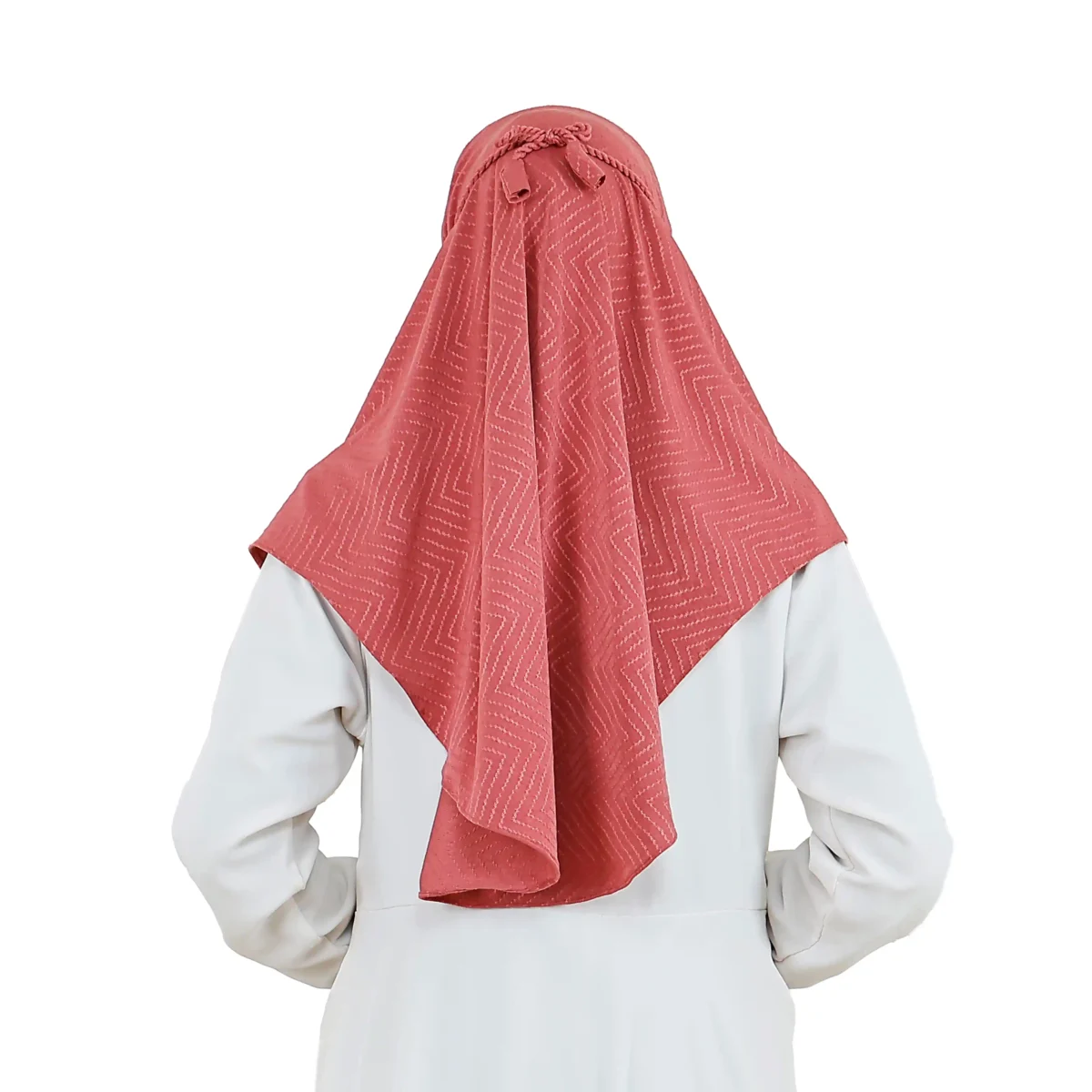 A woman models a Dusty Rose Chevron Hijab, facing forward and highlighting the subtle chevron print and the ready-to-wear style of the garment.