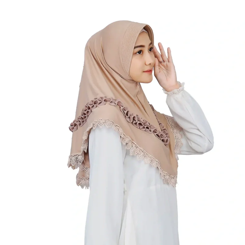 The rear view of the Elegant Beige Ruffled and Lace Hijab, highlighting the lace trim and the placement of the ruffle embellishments across the back.