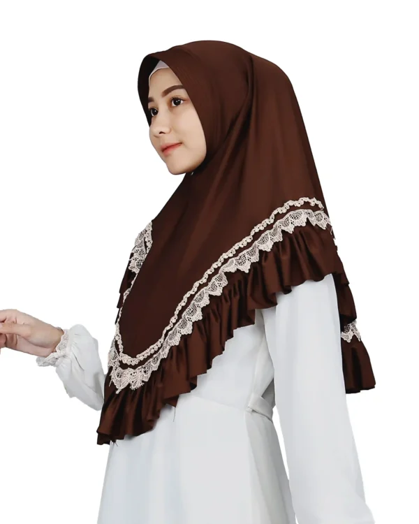 A woman models a Dark Brown Lace and Ruffle Hijab, facing the camera, highlighting the full coverage and the detailed white scalloped lace over the ruffles.