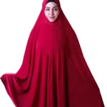 A woman modeling a beautiful Red Satin Hijab for Women, viewed slightly from the side, showcasing the elegant drape and the soft, subtle sheen of the fabric.