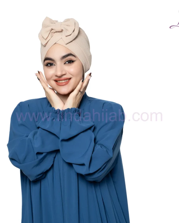 Beige Bow Accent Turban – Soft Texture & Playful Elegance